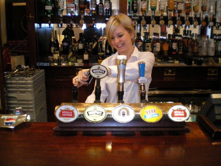 Dragon Hotel - Barmaid in action.jpg